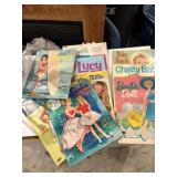 Nine vintage paper doll clothes cutouts, chatty