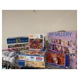 Approximately 23 puzzles, some new, ravensburger,