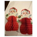 Two vintage red honeycomb paper Santa Claus