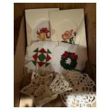 Four needlepoint Christmas decor and three