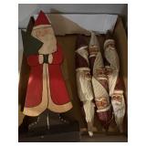 Three wooden Santa ornaments, 10 inches and shelf