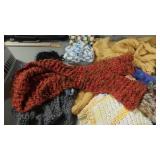 Knit scarves, booties and washcloths