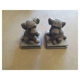 2 puppy statues