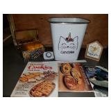 Caticorn waste basket, cookbooks, tin