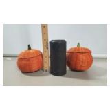 2 wicker pumpkins and black candle
