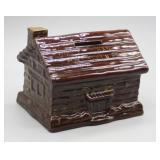 BROWN DRIP GLAZE POTTERY LOG CABIN COIN BANK