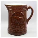 ANTIQUE POTTERY LONGHORN PITCHER 8.25"