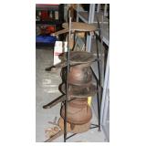 NS: STEEL RACK W/ LARGE ANTIQUE CAST IRON POTS W/