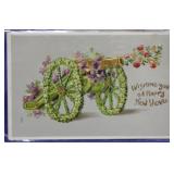 SHIP: C.1910 FLOWER CANNON NEW YEARS POSTCARD