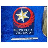 Metal and bossed beer sign