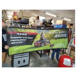 Two-sided Ferris lawn mower banner advertisement