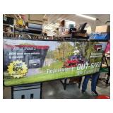 Two-sided Ferris lawn mower banner advertisement