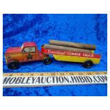 Vintage metal log truck toy