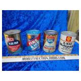 Advertising oil cans two of them are still full