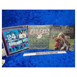 Rock and roll records Janis Joplin Bee gees