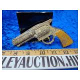 Metal toy gun possibly pocket knife