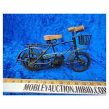 Small metal bike with working pedals and chain