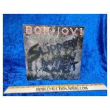 Bon Jovi record slippery when wet
