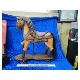 Beautiful antique horse on wheels