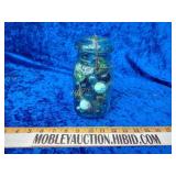 Vintage ball jar full of shooter marbles