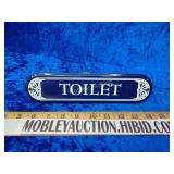 Porcelain toilet sign