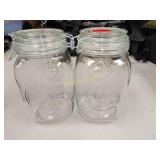 2 large locking sealed jars