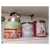 4 metal tins and a kettle