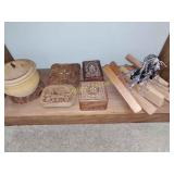 Shelf full wooden boxes and more