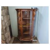 Beautiful curved glass curio cabinet with lions