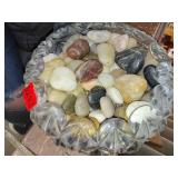 Huge bowl full of polished stones
