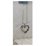 sterling silver and 10K yellow gold, featuring