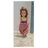 vintage hard plastic carnival doll produced in