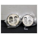 2 Penguins Hockey Pucks