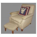 Upholstered chair with stool