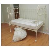 Antique wrought iron crib