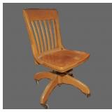 Rolling oak office chair