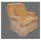 Vintage upholstered swivel rocker