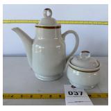 White tea pot and sugar