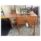 Vintage sewing machine and table