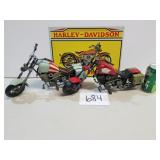 2 Metal Motorcycles and a Harley-Davidson Tin Sign