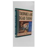 TROPHIES AND DEAD THINGS  MARCIA MULLER