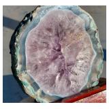 Polished amethyst geode slab