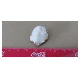 White, sparkling mineral cluster with translucent