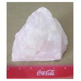 Raw, unpolished specimen of rose quartz