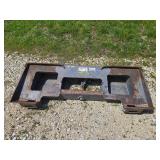 Skid loader attachment adaptor