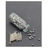 STERLING SILVER US FLAG CHARM AND A BOTTLE OF