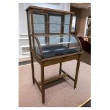 Bottom Arch Display Cabinet on Porcelain Casters,
