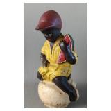 Black Americana Boy Sitting on a Chamber Pot