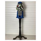 COUN OPERATED GUM BALL MACHINE ON CAST-IRON STAND
