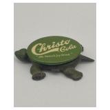 CHRISTO COLA METAL CAP/PIN ON SMALL CAST-IRON